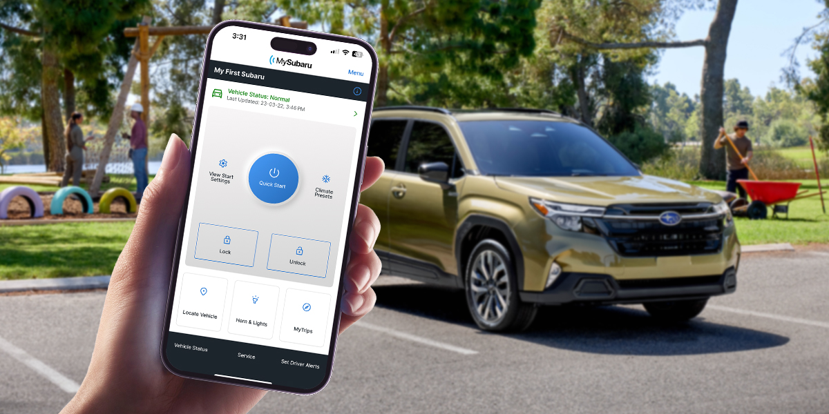 Hand holding phone with MySubaru App